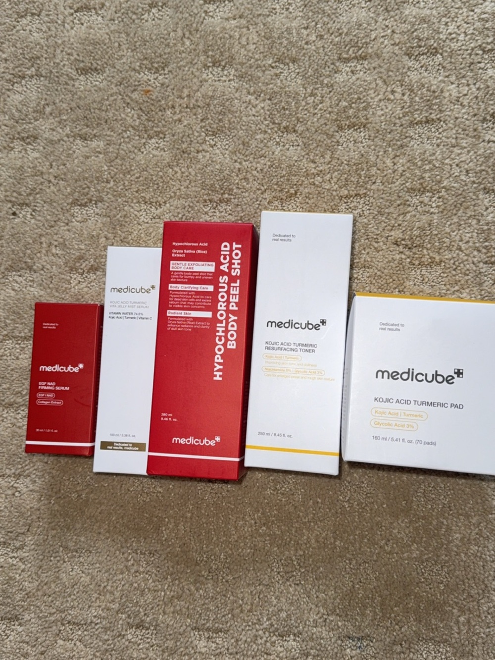 medicube Hypochlorous Acid Body Peel Shot & Kojic Acid Range in Red and White